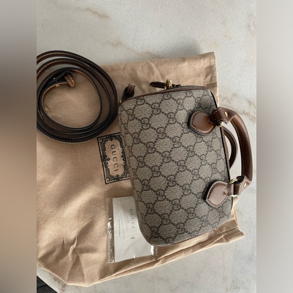 Gucci mini top handle bag. Like new- perfect condition. 
Dust bag included - Picture 4 of 7